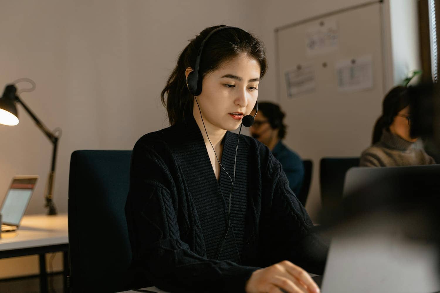 pexels-mart-production-7709191 (1) lady-wearing-black-on-a-call